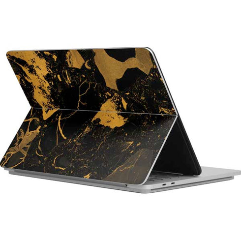Black and Gold Scattered Marble Surface Laptop Studio Skin